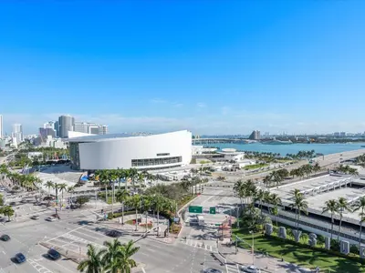 an aerial view of a city with a large building at Top-floor 3BR Stay with skyline views in Miami