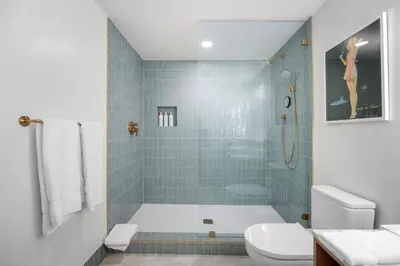 a bathroom with a shower and a toilet at 2916 Heart of Downtown Apt with Gym a Pool and a Coworking Space in Miami