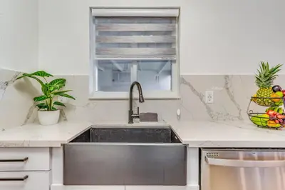 a kitchen with a sink and a window at Fox Private Resort- Near Downtown & Beach in Fort Lauderdale