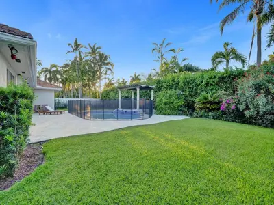 a backyard with a gazebo and a lawn at Casa Fina Miami Near Beaches