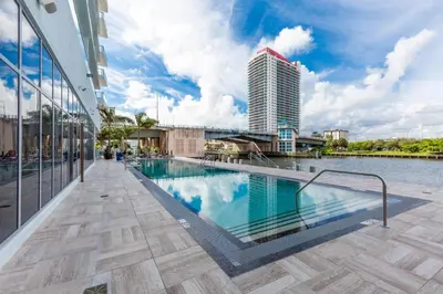 a swimming pool on the side of a building at Miami Escape 16th Floor – Near Hollywood Beach in Hollywood