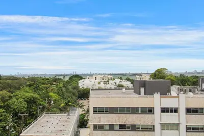 an overhead view of a building with trees at Luxury 1BR in Quadro Miami with Pool and Parking in Miami