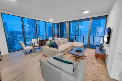 a living room with a couch and a table at High Floor Unit Heart Of Miami with pool and gym in Miami