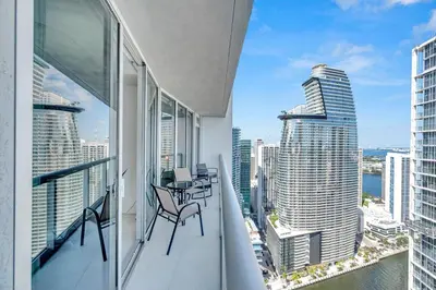 a balcony with a view of a city skyline at 48th Floor ocean View Brickell in Miami