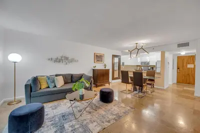 a living room with a couch and a table at Amazing unit location with amenities & parking in Miami