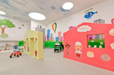 a childrens room with a pink wall and a city at Stylish 3BD-3BR at the Heart of Downtown Doral with Top Amenities & Golf in Miami
