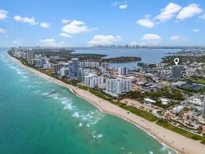 an aerial view of the beach and buildings at Stylish Miami Condo with Beach Access at 72 Park in Miami Beach