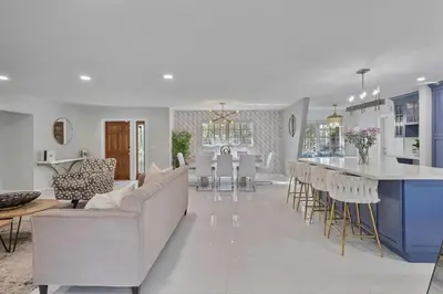 a living room and kitchen with a couch and a table at Modern Hollywood 3BR House Pool Jacuzzi in Hollywood