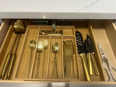 a drawer full of forks knives and spoons at Miami City Escape in Hialeah