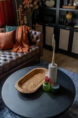 a table with a wooden plate on top of a room at Cozy 2br 5 mins drive to the beach j6 in Hollywood