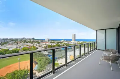 a balcony with a view of the ocean at NOK Fantastic 1 BR Den in Miami in Miami Beach