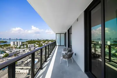 a balcony with a view of the city at Chic Miami Retreat Stylish 2BR Gem for 5 in Miami Beach