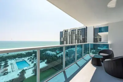a balcony with a view of the ocean at Large 2 Bedroom Oceanfront at Roney Palace in South Beach in Miami Beach
