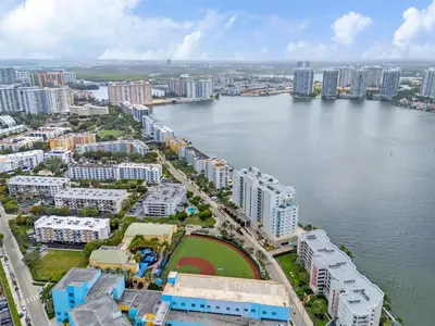 an aerial view of a city with a body of water at Waterview Luxury 2-Bedroom Condo Sunny Isles Beach in Sunny Isles Beach