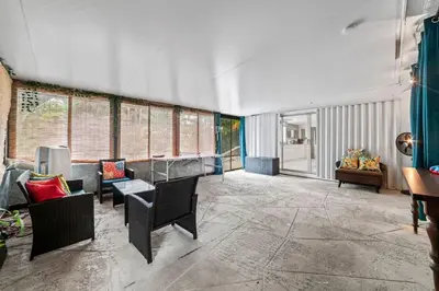 a living room with couches and chairs at Oasis with Pool & Cold Plunge-Near Beach & Nightlife in Fort Lauderdale