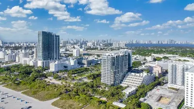 an aerial view of a city with tall buildings at Stunning Oceanfront 2BR W Hotel in Miami Beach