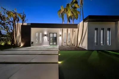 a rendering of a house with palm trees at night at Villa Coral Wave in Miami