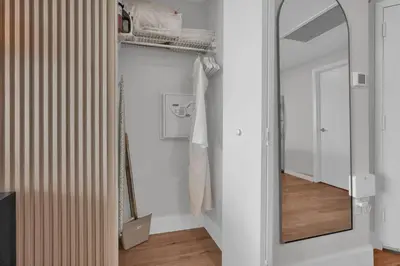 a dressing room with a mirror and a closet at The Harmony - Ocean and Relaxation in Miami