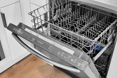a dishwasher with dishes inside of it at The Harmony - Ocean and Relaxation in Miami