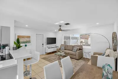 a living room with a couch and a table at Victoria Park's Secret #2 - 6ppl in Fort Lauderdale