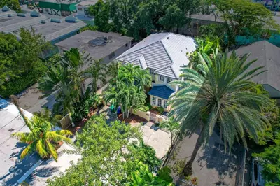 an overhead view of a house with palm trees at Home Away From Home in Coconut Grove in Miami