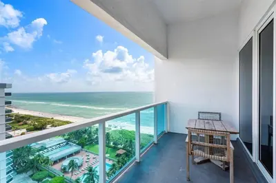 a balcony with a view of the ocean at Villa Royale Residences in Miami Beach