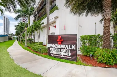 a sign on the side of a building at 2BR 2BA at Beachwalk on 29 floor Full Equiped in Hallandale Beach
