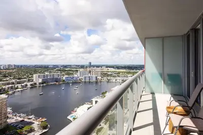 a view of a river from the balcony of a building at 2BR 2BA at Beachwalk on 29 floor Full Equiped in Hallandale Beach
