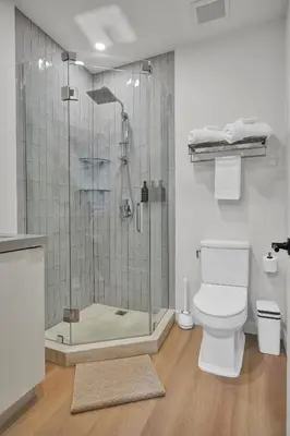 a bathroom with a shower and a toilet at Prestige Retreat by Renzzi in Miami