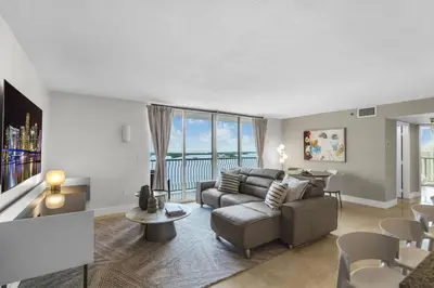 a living room with a couch and a table at Stunning 3B2B with Ocean and City Views - Free Parking in Miami