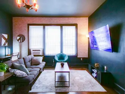 a living room with a couch and a table at Cozy 2Bed 1Bath in Edgewater Miami in Miami