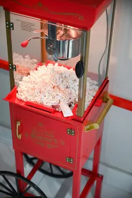 a red machine with a pile of popcorn at Olympia LUX House 4BR, Heated POOL, BBQ, BAR in Miami