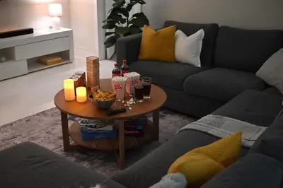a living room with a table with drinks on it at Olympia LUX House 4BR, Heated POOL, BBQ, BAR in Miami