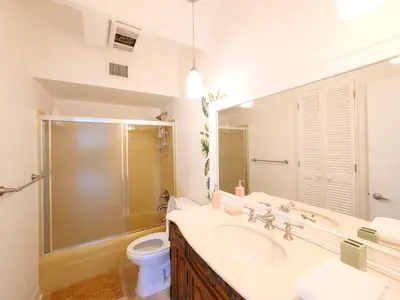 a bathroom with a shower and a sink and a toilet at 3BD Tropical Luxe Stay with Pool, Gameroom and Grill in Fort Lauderdale