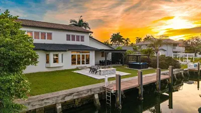 a house on the water with a dock at Villa Asher - Waterfront with dock in Miami