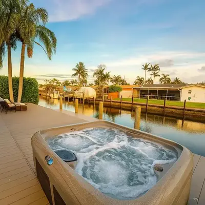 Waterfront HotTub Steps from the Airport Boat Slip