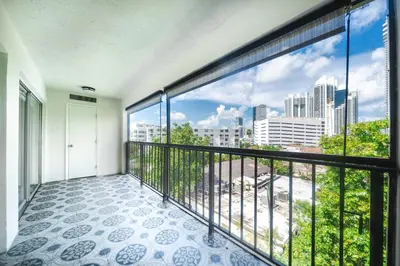 a balcony with a view of a city at Cozy place near Beachside in Sunny Isles Beach