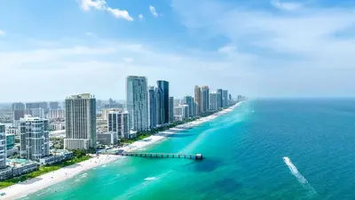 an aerial view of the beach in front of a city at Cozy place near Beachside in Sunny Isles Beach