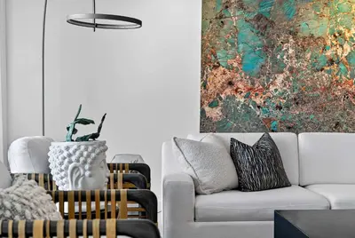 a living room with a couch and a painting at Auberge Blue by Rove Travel Oceanfront with Balcony in Fort Lauderdale