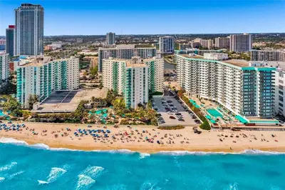 an aerial view of a beach and buildings at Beachfront 2BR at The Tides | EPIC Stay in Hollywood