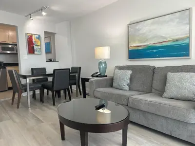 a living room with a couch and a table at Ocean Breeze Condo - Intracostal and Ocean views at GalleryOne in Fort Lauderdale
