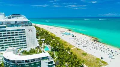 an aerial view of a beach and the ocean at Skyline View Private Residence at Carillon Resort - 705 in Miami Beach