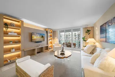 a living room with a white couch and a table at Oceanview Private Residence at 1 Hotel and Homes - 1202 in Miami Beach