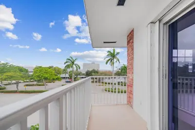a balcony with a view of a street at Las Olas & Beachside getaway with pool in Fort Lauderdale