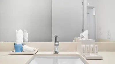a bathroom sink with a faucet and a mirror at Hyde House in Hollywood