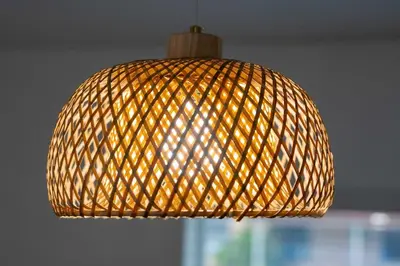 a brown wicker lamp hanging from a ceiling at Miami Modern Studio minutes to Wynwood & Downtown in Miami