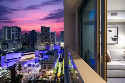 a view of a city skyline from a balcony at KING OF MIAMI - Downtown Free Parking Pool Gym in Miami