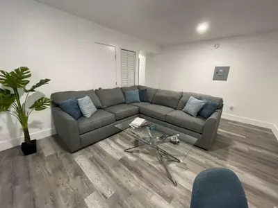a living room with a couch and a table at KING OF MIAMI - 1 mile from Brickell 2BD Apartment! in Miami