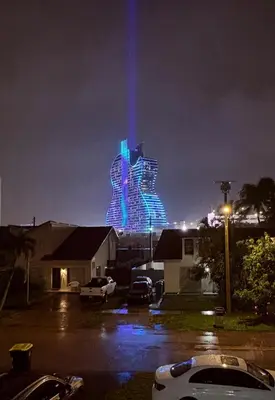 a lit up building with blue lights at night at 3-BDR Guitar House, Walk to Casino, located close to EVERYTHING! in Fort Lauderdale