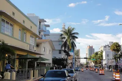 a busy city street with traffic cones and buildings at The Blue Breeze - Parking included in Miami Beach